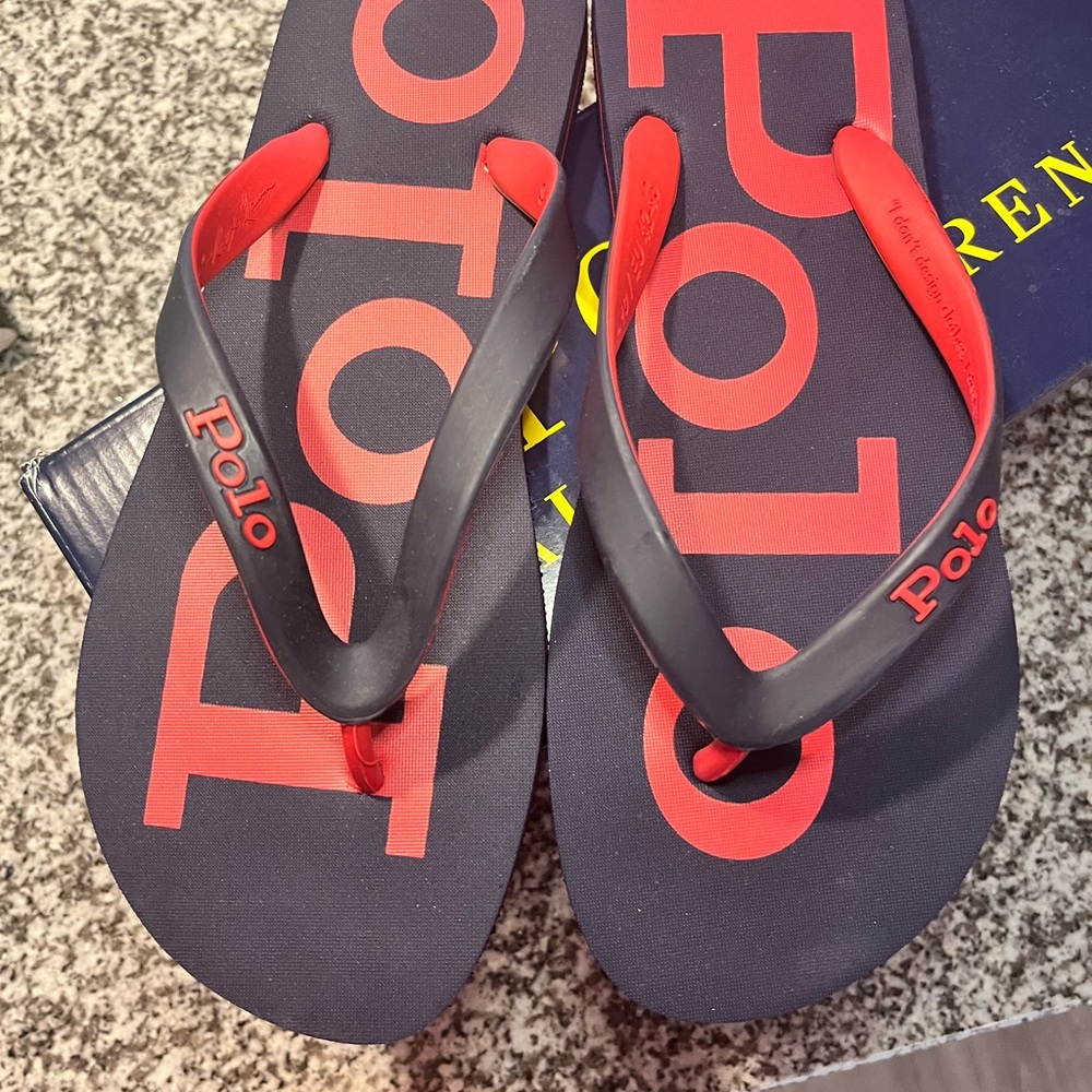Red and blue Ralph Lauren polo flip-flops.